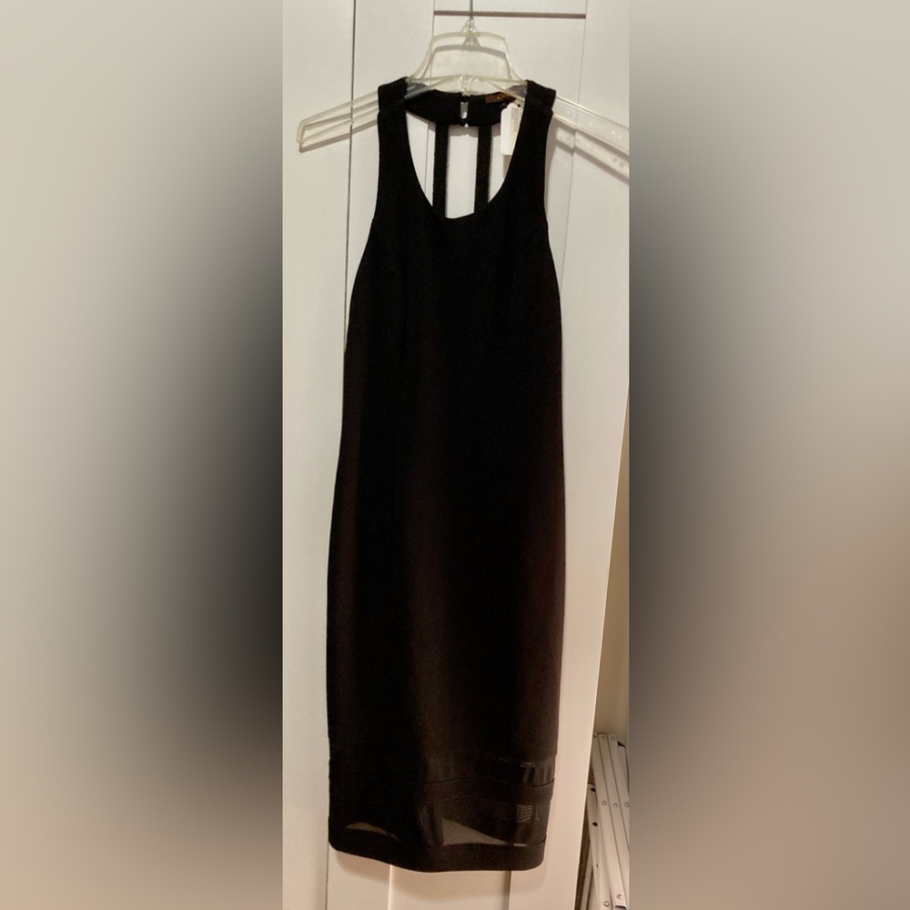 Black party dress with low back edged in gold sequins and beading 42” long